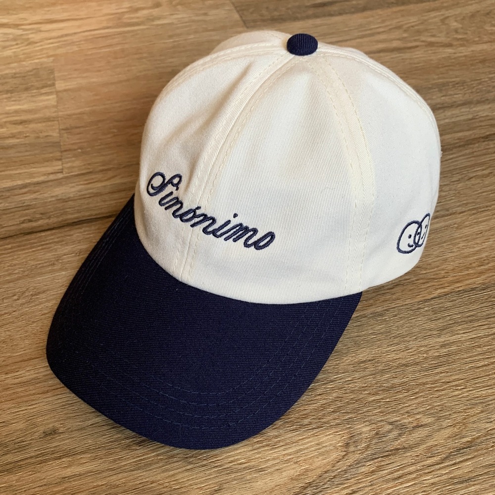 Sinonimo Baseball Cap in White and Navy Blue - Snapback Hat w Smiley Face
